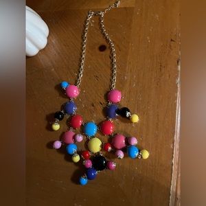 Bauble colorful necklace.   Hangs below collar bone